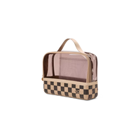 A rectangular toiletry bag with a transparent smoky pink upper section, a beige top handle, and a beige-and-dark-brown checkerboard lower section. A small interlocking 'BC' logo is visible on the front.