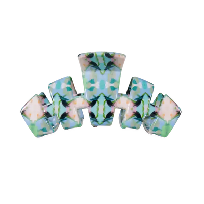 A multi-piece hair claw clip set featuring a symmetrical, mirrored pattern of light blue, mint green, and soft pink with dark green leaf-like accents, shown on a plain white background.