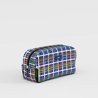 A rectangular zippered pouch with a colorful plaid pattern in blue, purple, green, yellow, and white, featuring a small blue brand patch on the front, set against a light gray background.