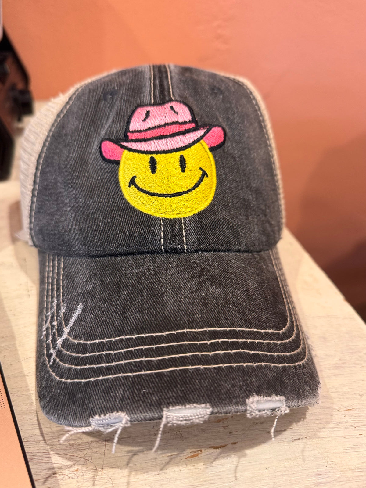 The Pink Cowboy Hat Happy Face Trucker Hat