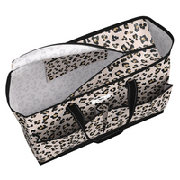 Leopard print storage bag with a white interior on a white background