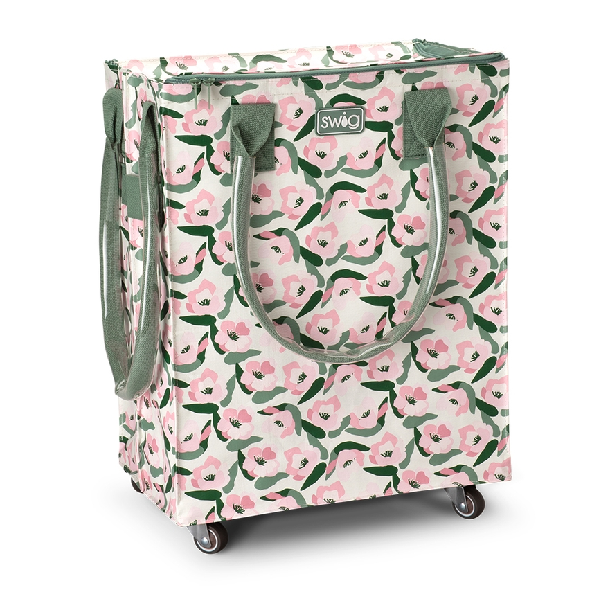 A rolling storage cart with a pink and green floral pattern, featuring olive green handles and a small 'swag' brand logo on the front, set against a plain white background.